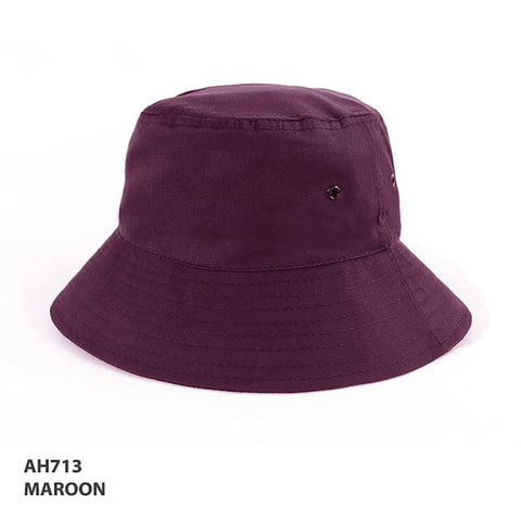 A maroon polycotton bucket hat with a wide brim and metal vents. It features a logo on the side.